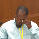In this image from video, witness Donald Williams wipes his eyes as he answers questions, as Hennepin County Judge Peter Cahill presides Tuesday, March 30, 2021, in the trial of former Minneapolis police officer Derek Chauvin at the Hennepin County Courthouse in Minneapolis, Minn.